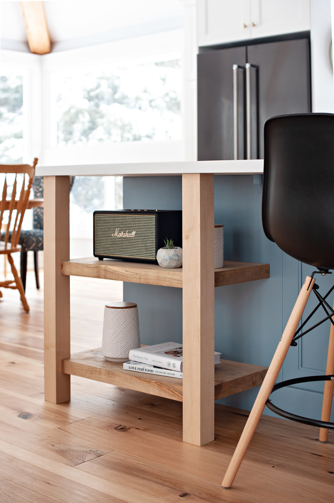 Example of a transitional home design design in Toronto