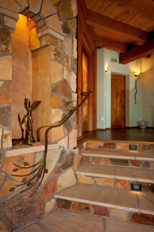 Inspiration for a rustic entryway remodel in Phoenix