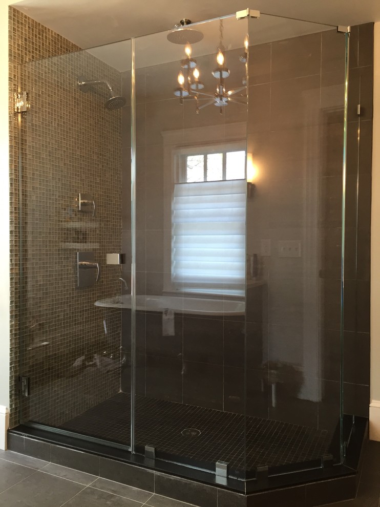 Design ideas for a contemporary master bathroom in New York with a corner shower.