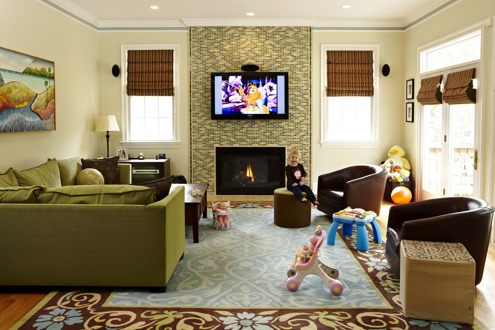 Traditional family room in DC Metro with a tile fireplace surround.
