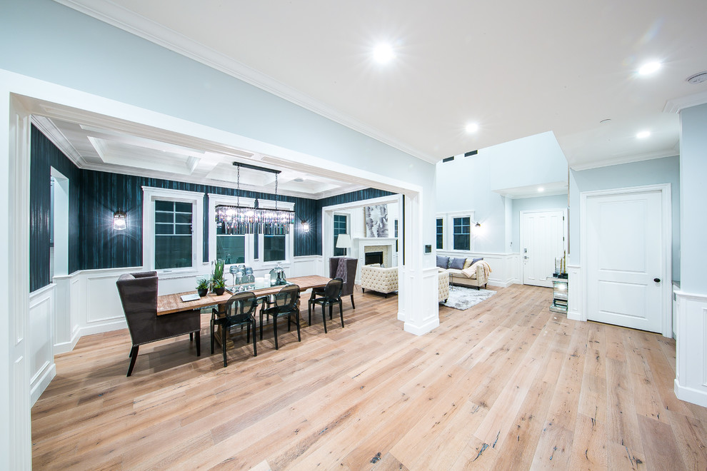 Large transitional separate dining room in Los Angeles with multi-coloured walls, light hardwood floors, brown floor and no fireplace.