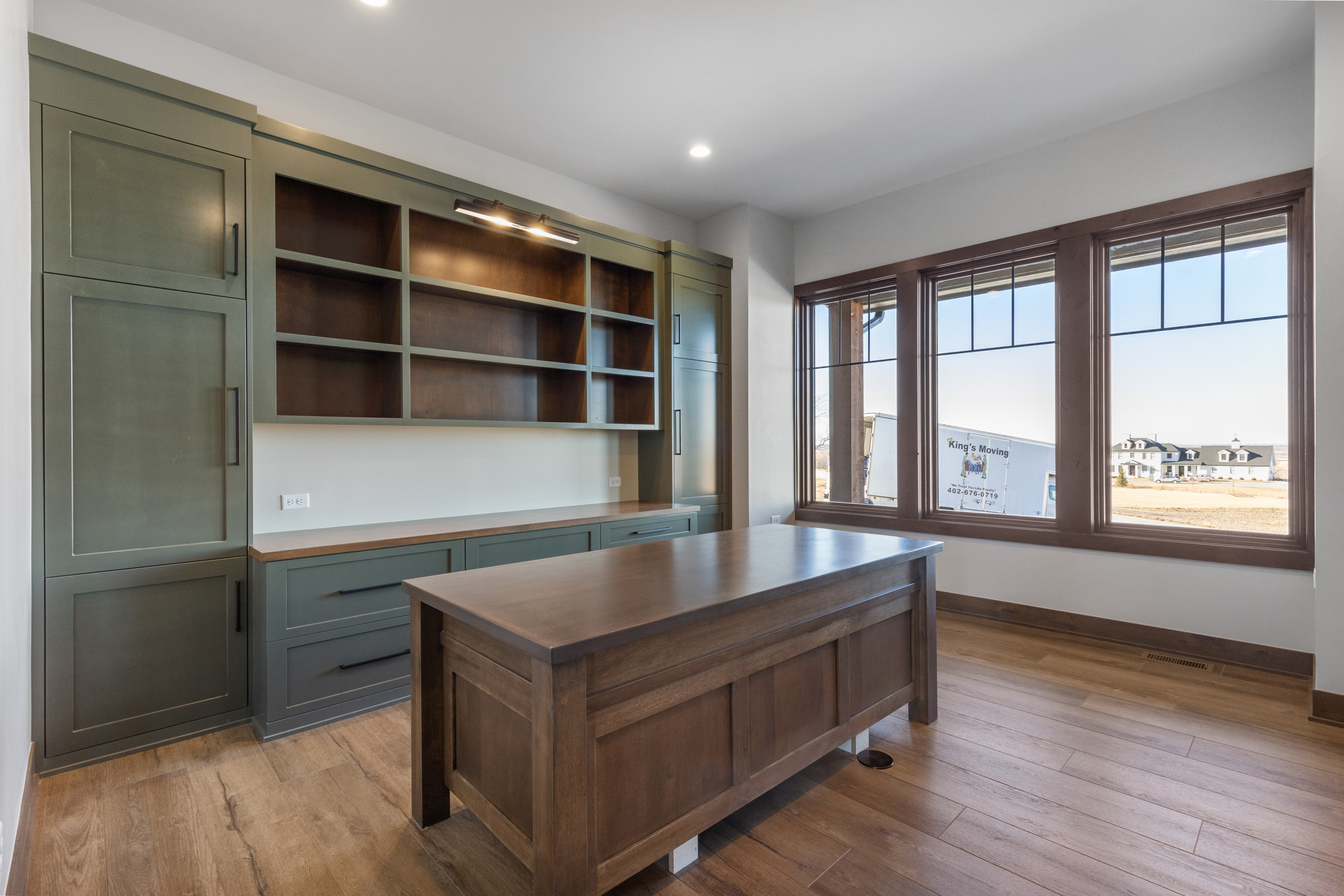 Example of a mountain style home office design in Omaha
