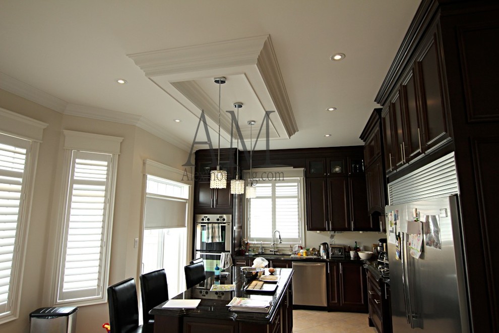 Example of a minimalist kitchen design in Toronto
