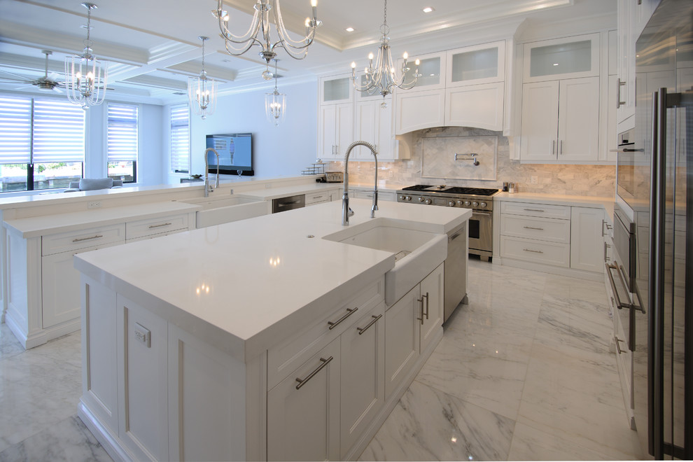 Open concept kitchen - large transitional u-shaped marble floor and white floor open concept kitchen idea in Miami with beaded inset cabinets, white cabinets, quartz countertops, white backsplash, an island, a farmhouse sink, marble backsplash and stainless steel appliances