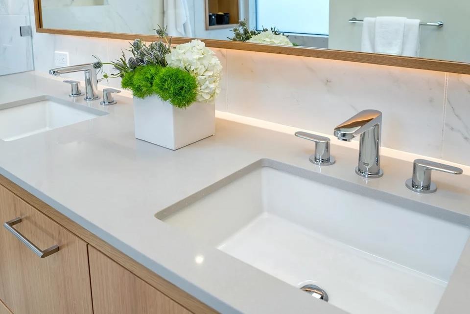 Inspiration for a mid-sized modern master bathroom in San Francisco with flat-panel cabinets, light wood cabinets, an open shower, gray tile, marble, grey walls, concrete floors, an undermount sink, marble benchtops, grey floor, an open shower and white benchtops.