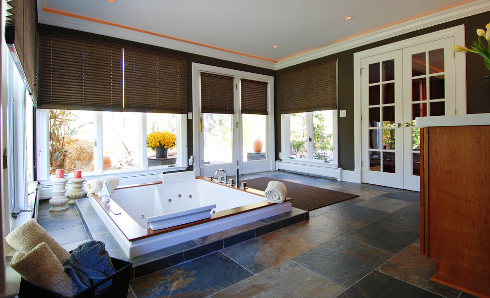 Inspiration for a large traditional bathroom in Detroit with flat-panel cabinets, brown cabinets, a hot tub, an open shower, a one-piece toilet, multi-coloured tile, slate, brown walls, slate floors, an undermount sink, quartzite benchtops, multi-coloured floor, an open shower and white benchtops.