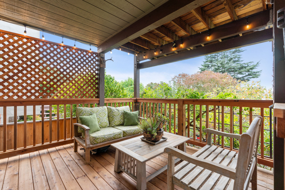 Large mountain style backyard second story wood railing deck photo in San Francisco with no cover