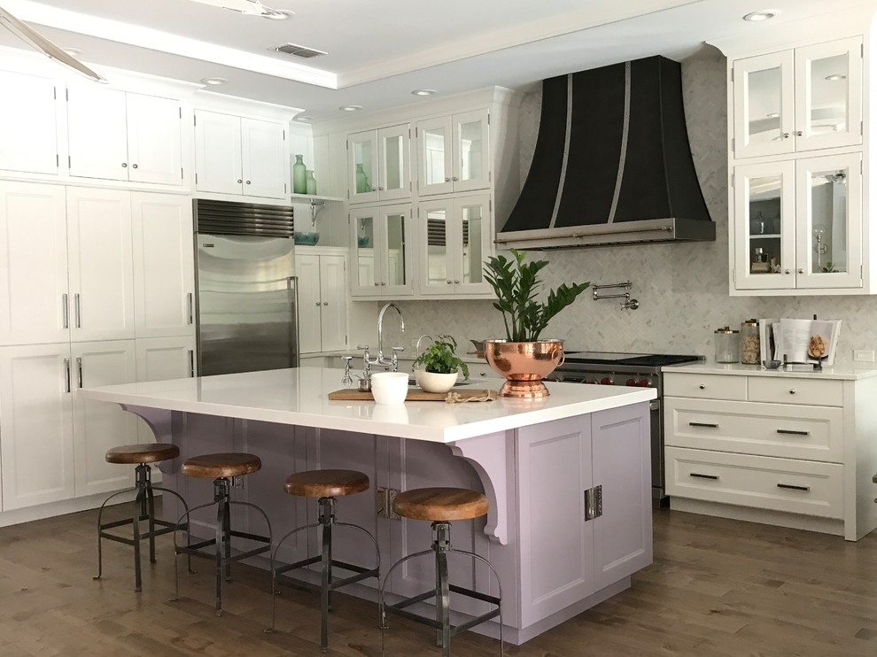 Design ideas for an expansive traditional l-shaped eat-in kitchen in Salt Lake City with a drop-in sink, beaded inset cabinets, purple cabinets, quartz benchtops, multi-coloured splashback, marble splashback, stainless steel appliances, medium hardwood floors, with island, brown floor and white benchtop.