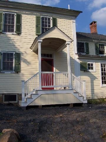 Elegant beige two-story wood exterior home photo in Philadelphia