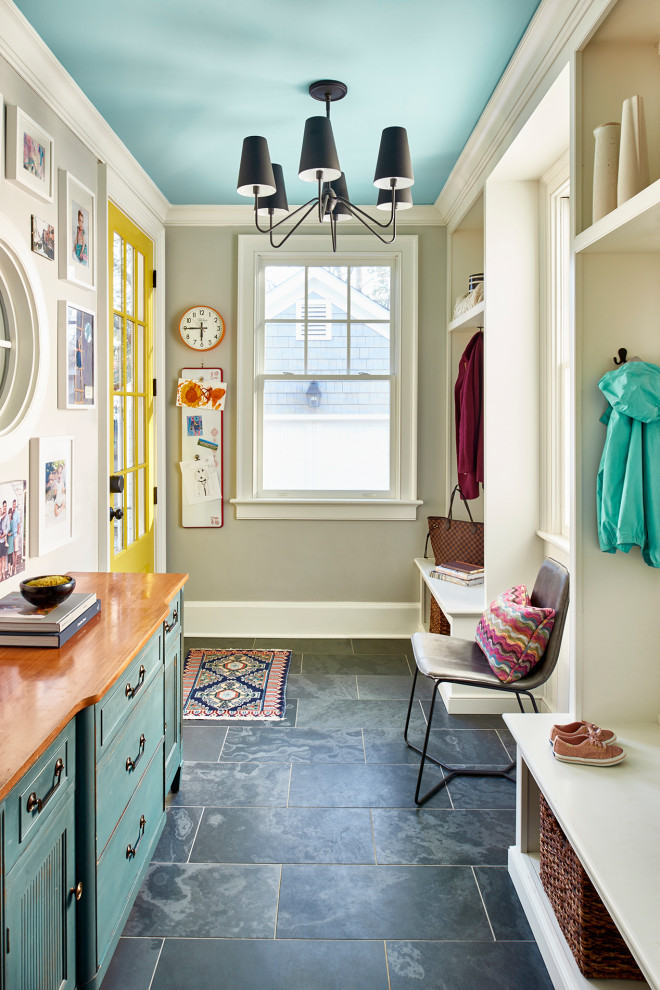 Design ideas for a mid-sized transitional mudroom in Atlanta with grey walls, slate floors, a single front door, a yellow front door and grey floor.