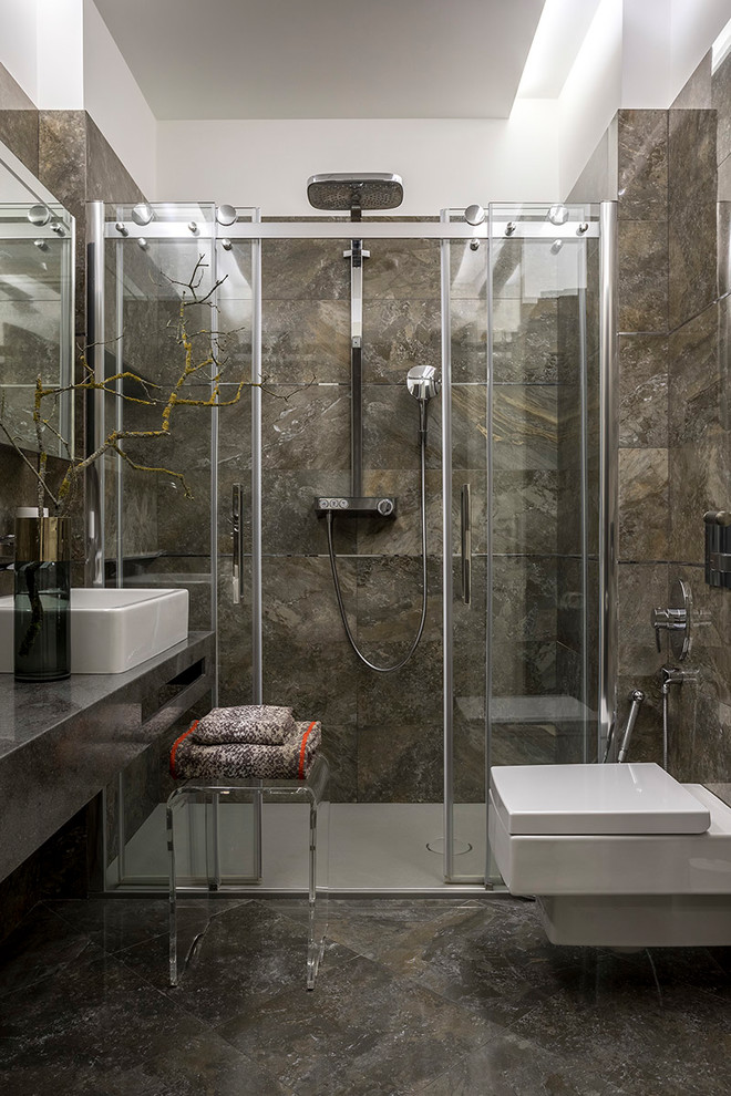 Mid-sized contemporary 3/4 bathroom in Moscow with flat-panel cabinets, black cabinets, an alcove shower, a wall-mount toilet, brown tile, ceramic tile, porcelain floors, engineered quartz benchtops, brown floor, a sliding shower screen and a vessel sink.