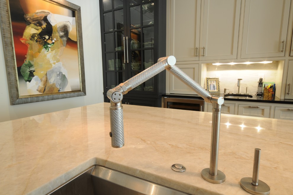 Inspiration for a large transitional u-shaped dark wood floor and brown floor open concept kitchen remodel in Birmingham with an undermount sink, shaker cabinets, white cabinets, granite countertops, white backsplash, mosaic tile backsplash, paneled appliances and an island