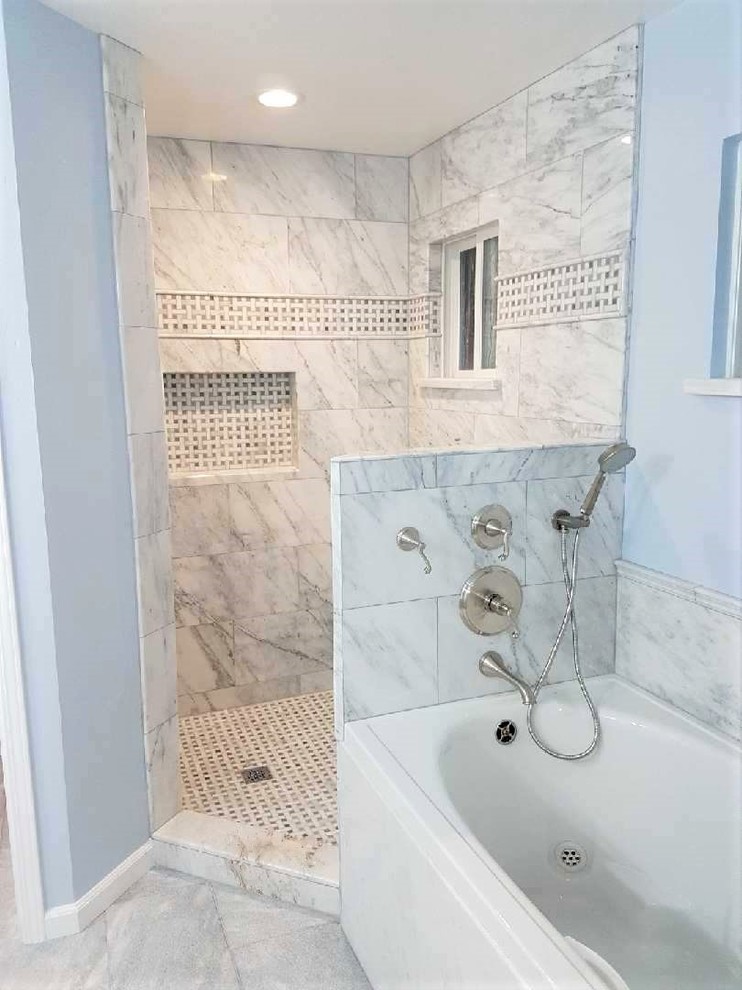 This is an example of a large contemporary master bathroom in San Francisco with a hot tub, an open shower, white tile, marble, blue walls, marble floors, marble benchtops, grey floor and an open shower.
