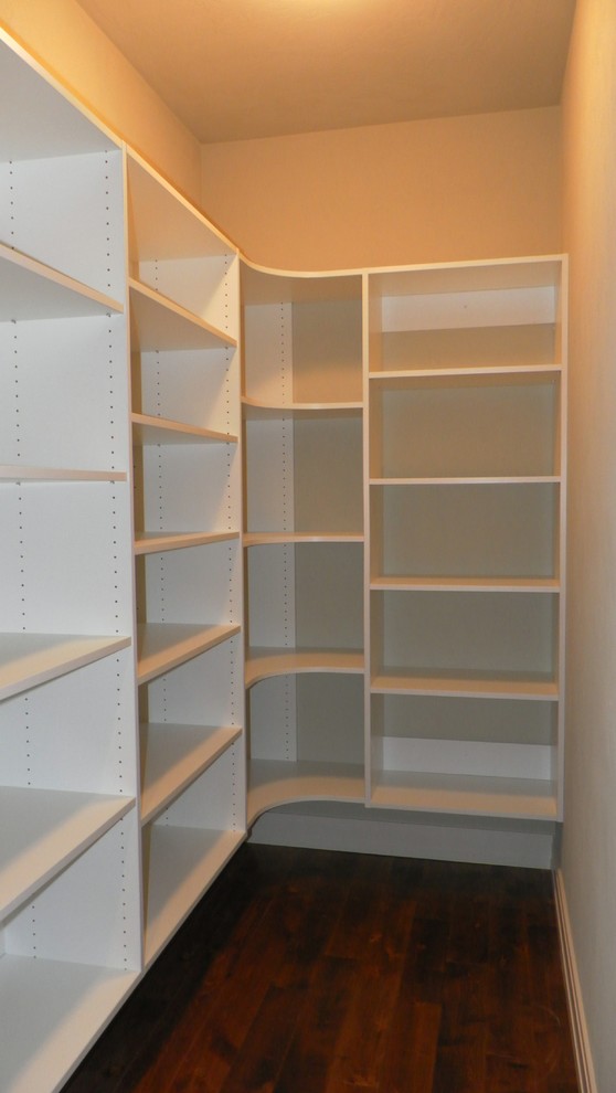 This is an example of a country storage and wardrobe in Other.