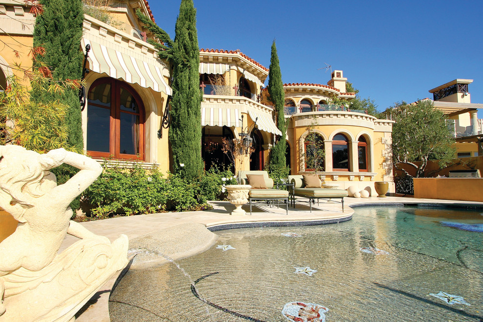 Photo of a mediterranean custom-shaped pool in Orange County.