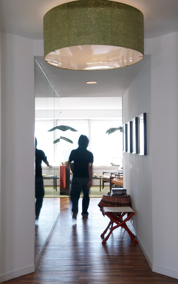 Inspiration for a contemporary hallway in New York with white walls.