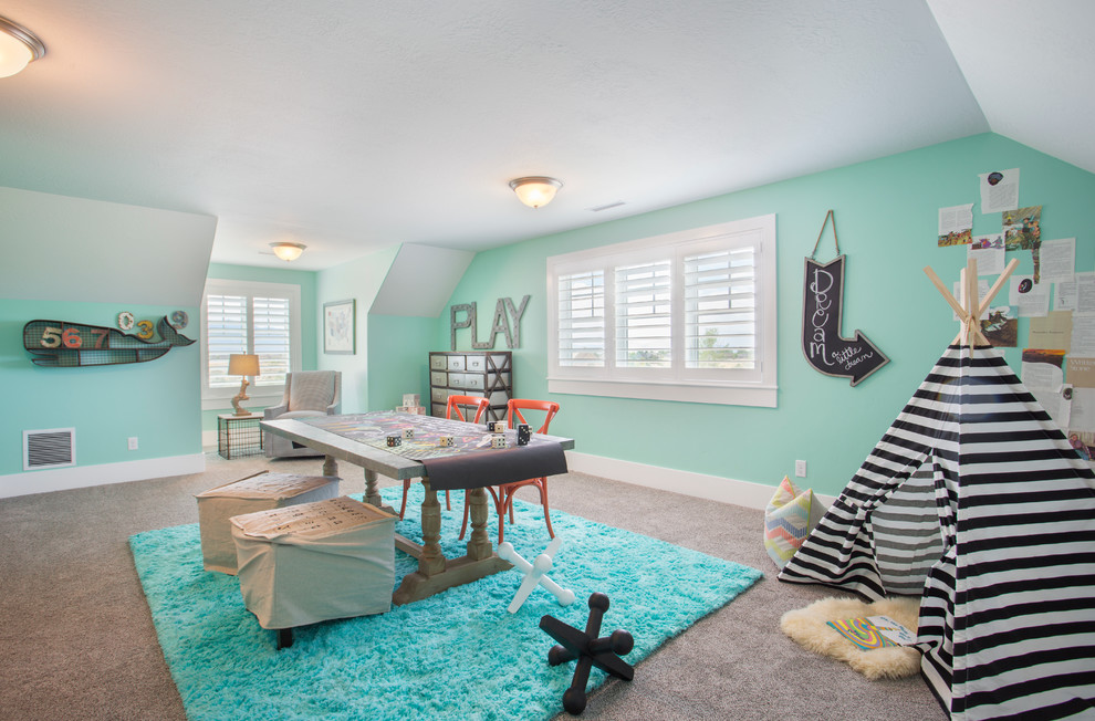 Large transitional gender-neutral kids' playroom in Salt Lake City with carpet, green walls and beige floor for kids 4-10 years old.