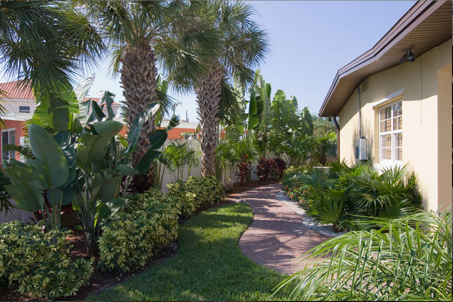 This is an example of a large side yard stone landscaping in Tampa.