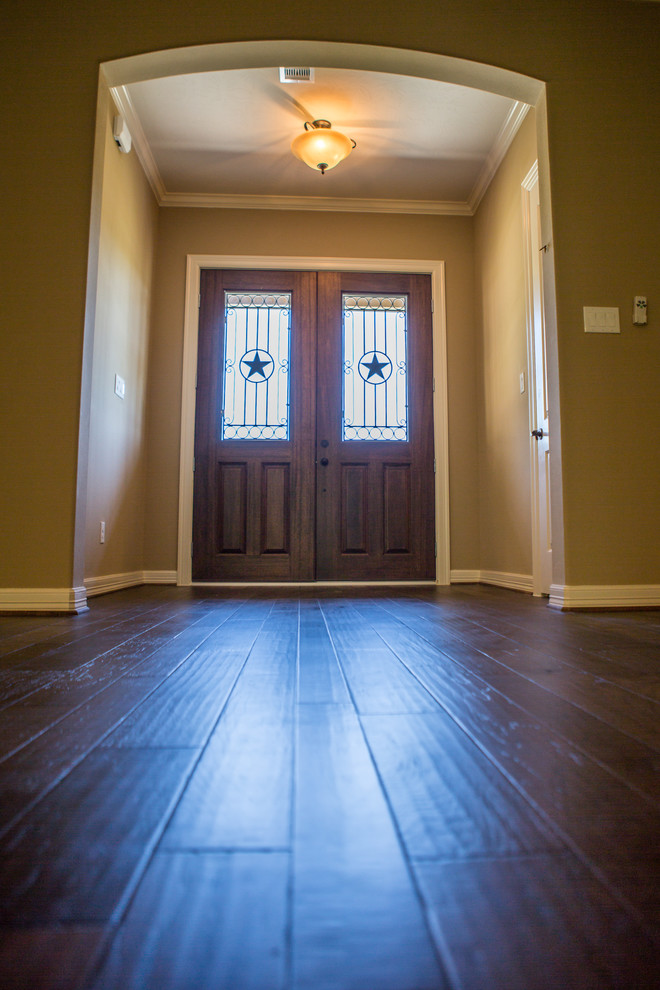 Inspiration for a rustic entryway remodel in Houston