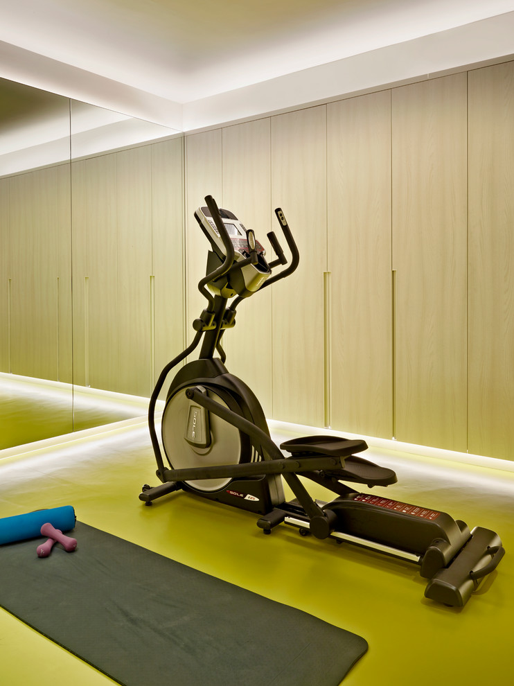 This is an example of a contemporary home gym in London.