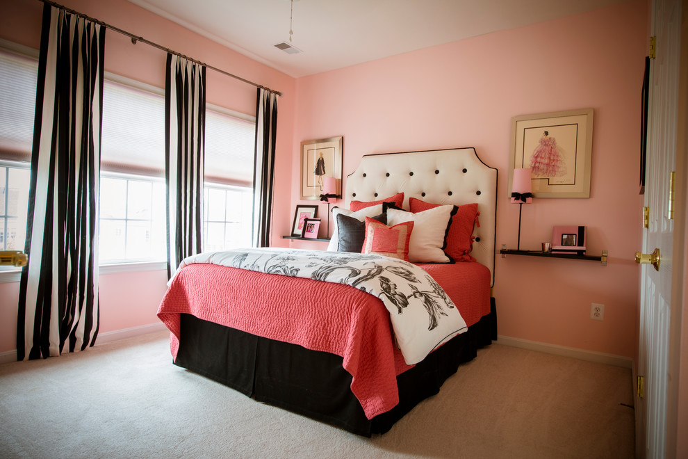 This is an example of a mid-sized contemporary kids' bedroom for kids 4-10 years old and girls in DC Metro with pink walls, carpet and beige floor.