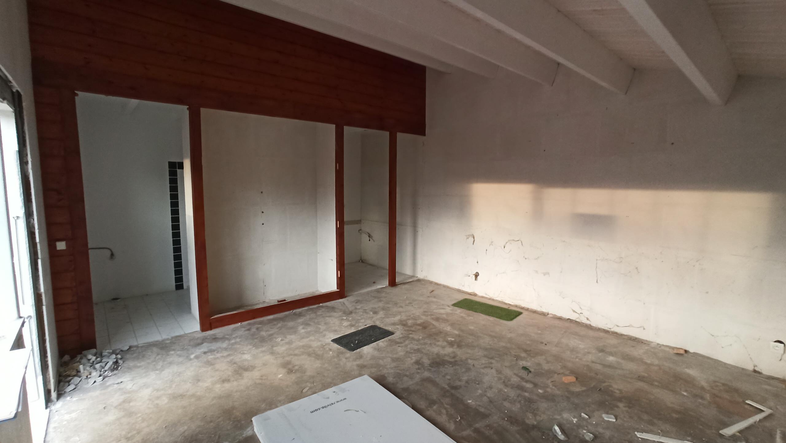 Transformation d'une chambre parentale en pièce de vie/cuisine