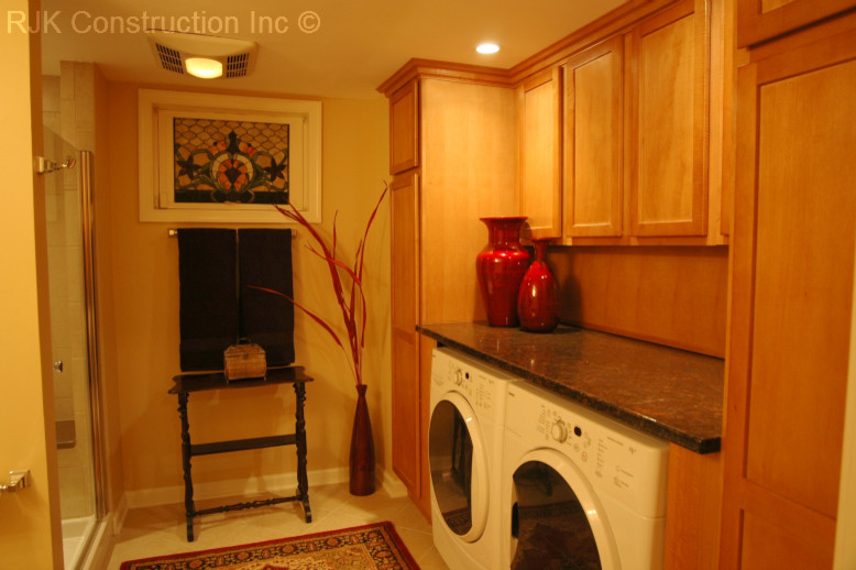 This is an example of a contemporary laundry room in DC Metro.