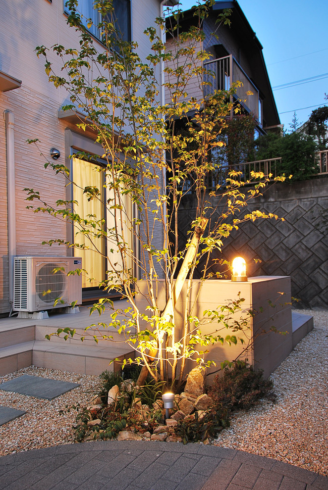 Ejemplo de terraza asiática con iluminación