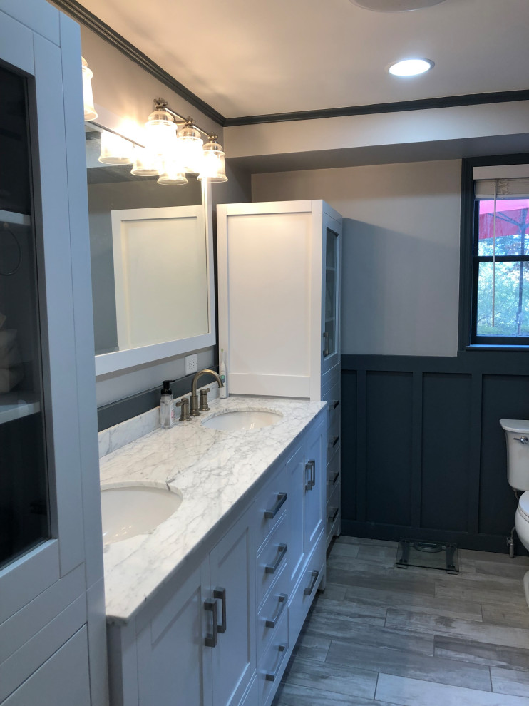 Master bathroom photo with granite countertops and multicolored countertops