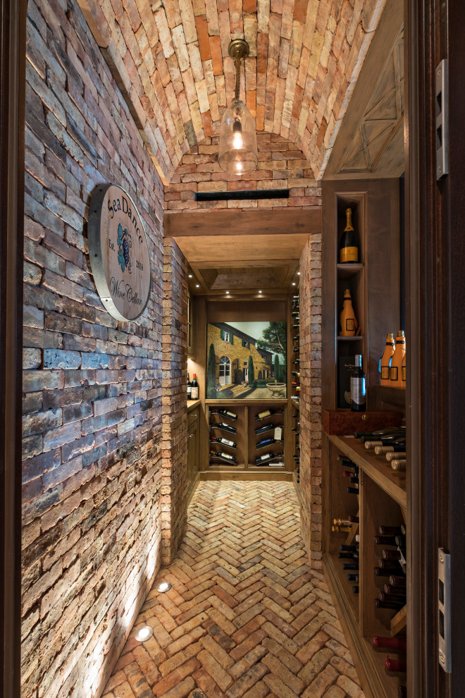 Inspiration for a beach style wine cellar in Miami with brick floors, diamond bins and brown floor.