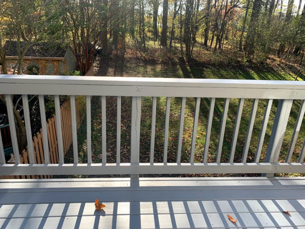 Deck - mid-sized modern second story wood railing deck idea in Baltimore