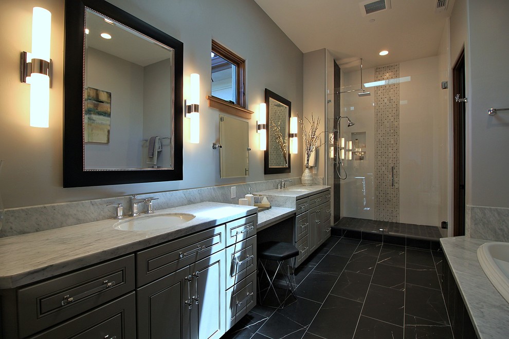Inspiration for a large transitional master bathroom in San Francisco with shaker cabinets, grey cabinets, a hot tub, gray tile, stone slab, porcelain floors, engineered quartz benchtops, black floor and grey benchtops.