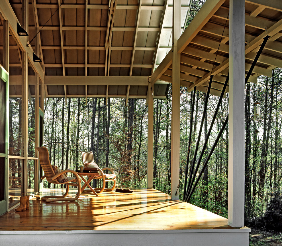 Inspiration for a country verandah in Atlanta with decking and a roof extension.
