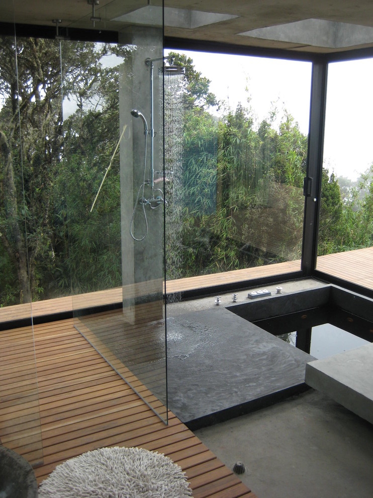 This is an example of a contemporary bathroom in Other with an open shower and an open shower.