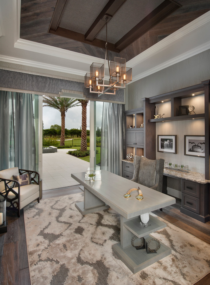 Design ideas for a transitional study room in Miami with grey walls, dark hardwood floors and a freestanding desk.