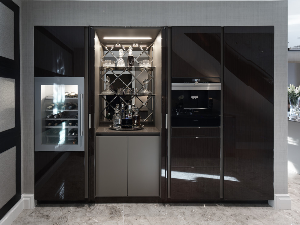 Inspiration for a medium sized contemporary enclosed kitchen with a built-in sink, flat-panel cabinets, brown cabinets, granite worktops, brown splashback, mirror splashback, black appliances, porcelain flooring, an island and brown floors.