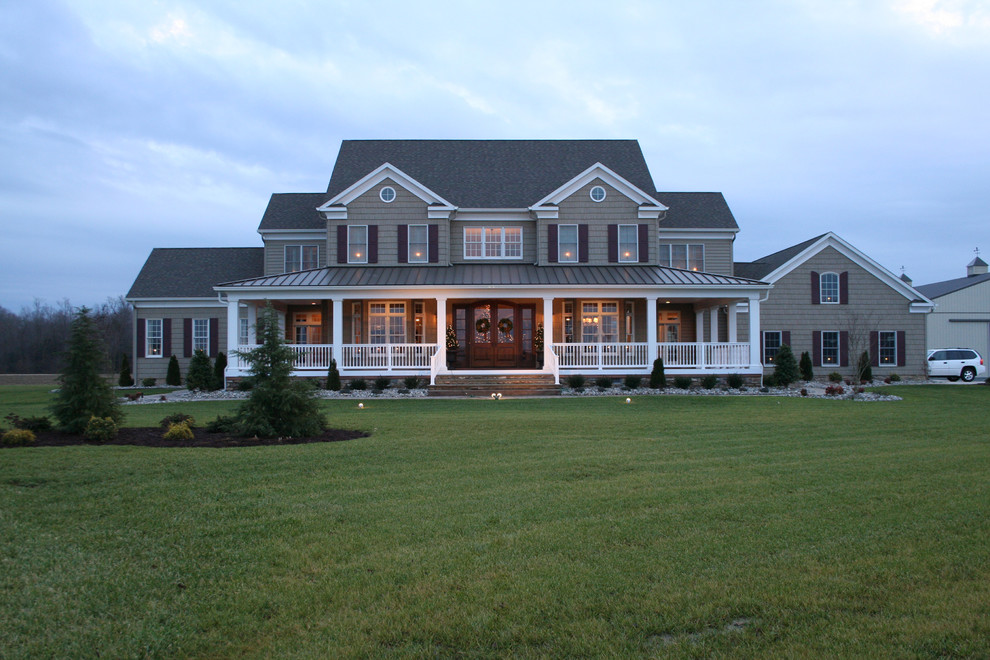 Design ideas for a large traditional two-storey brown exterior in Los Angeles with wood siding and a hip roof.