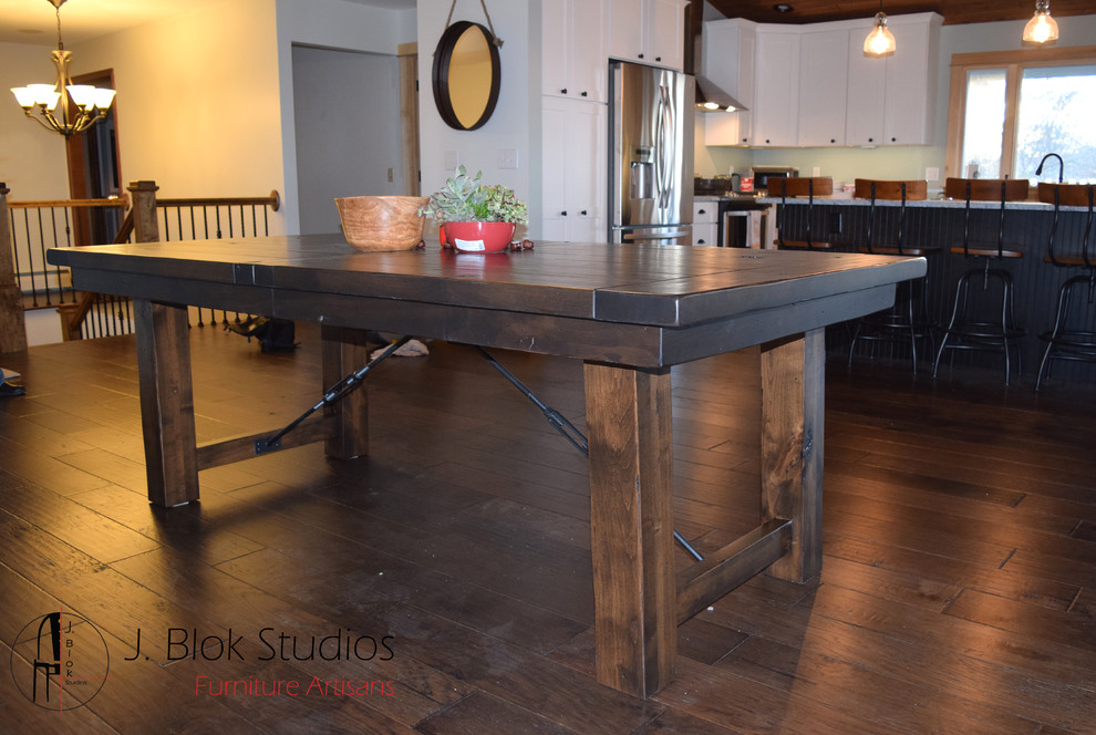 Dining room - rustic dining room idea in Grand Rapids