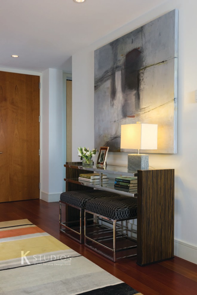 Entryway - transitional entryway idea in Denver with a medium wood front door