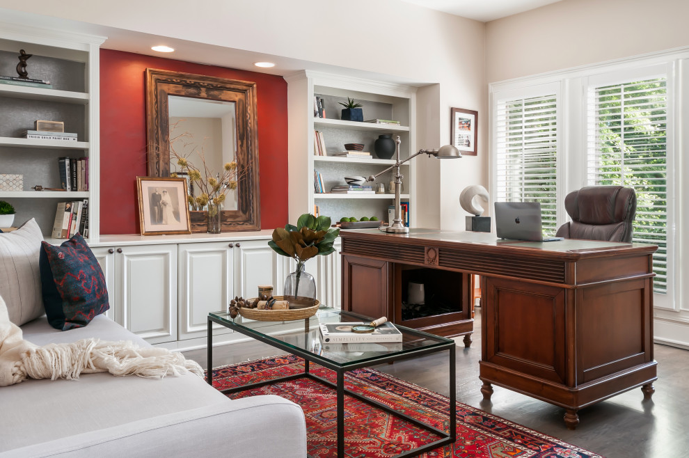 This is an example of a medium sized eclectic home office in Atlanta with beige walls, medium hardwood flooring, a freestanding desk and grey floors.