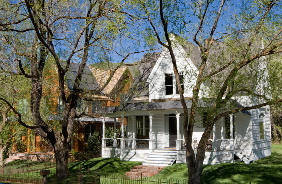 Inspiration for a transitional two-story wood exterior home remodel in Denver