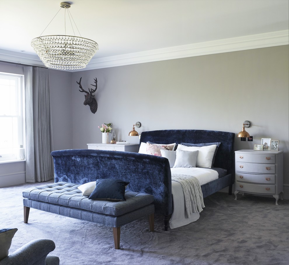 Design ideas for a transitional bedroom in Surrey with blue floor.