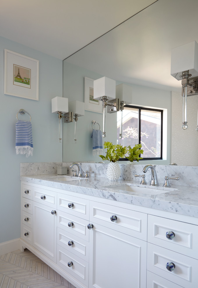 Design ideas for a mid-sized transitional kids bathroom in San Francisco with white cabinets, an alcove tub, a shower/bathtub combo, a two-piece toilet, gray tile, stone tile, blue walls, marble floors, an undermount sink, marble benchtops and recessed-panel cabinets.