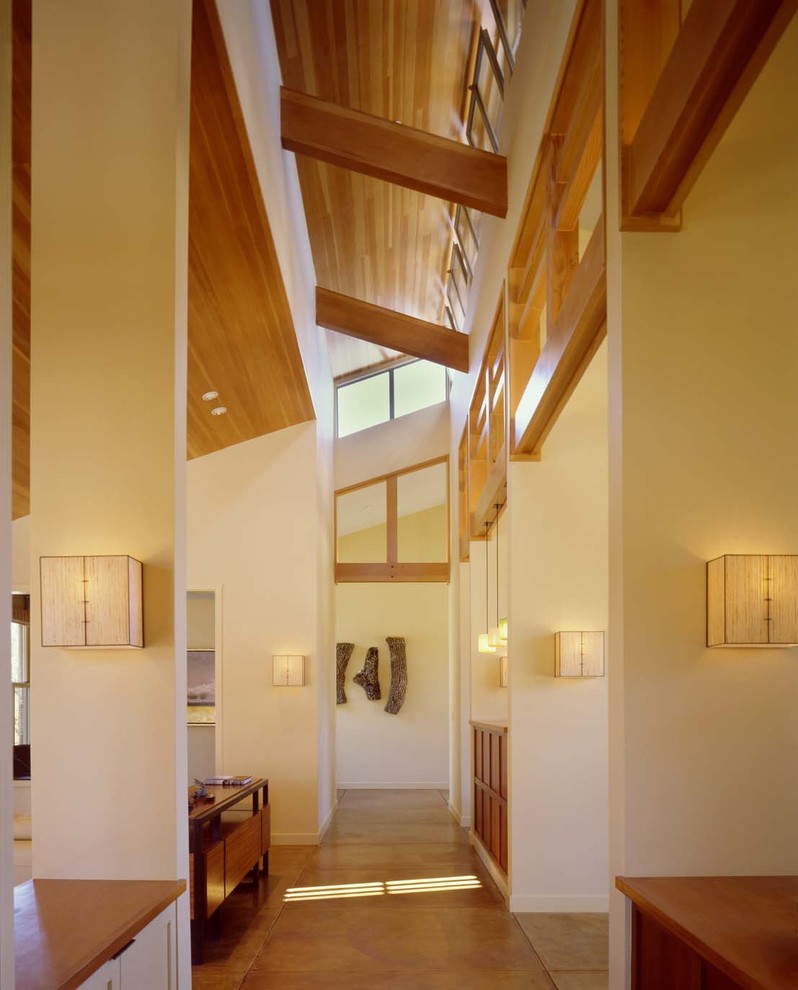 Design ideas for a contemporary hallway in San Francisco with concrete floors.