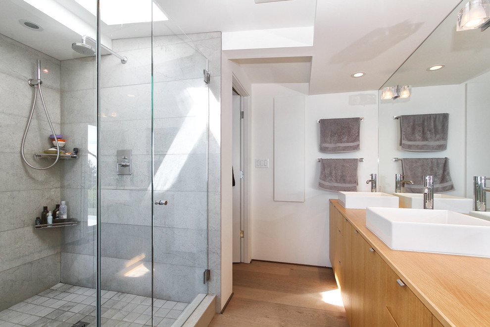 Design ideas for a contemporary bathroom in Vancouver with a vessel sink.