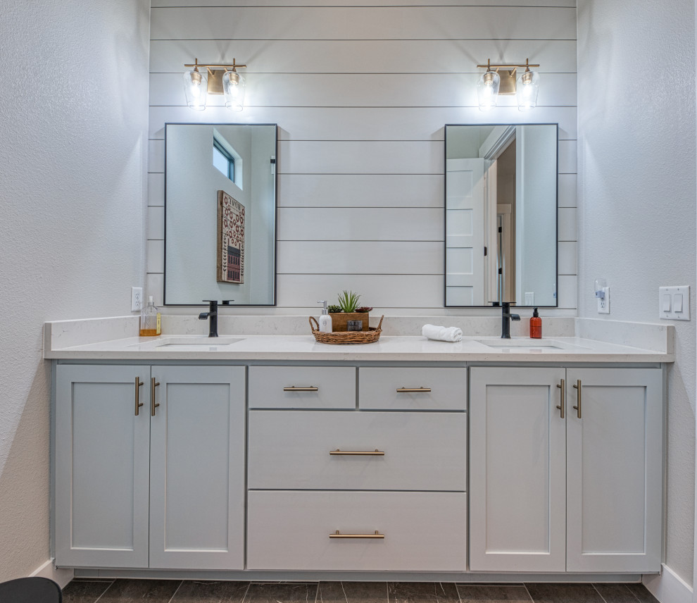 Country kids bathroom with shaker cabinets, white cabinets, an undermount sink, quartzite benchtops, grey floor, white benchtops, a double vanity and a built-in vanity.