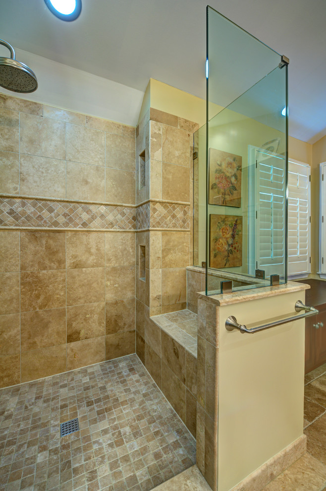 Design ideas for a large traditional master bathroom in DC Metro with an undermount sink, raised-panel cabinets, dark wood cabinets, engineered quartz benchtops, a corner shower, a one-piece toilet, beige tile, yellow walls and ceramic floors.
