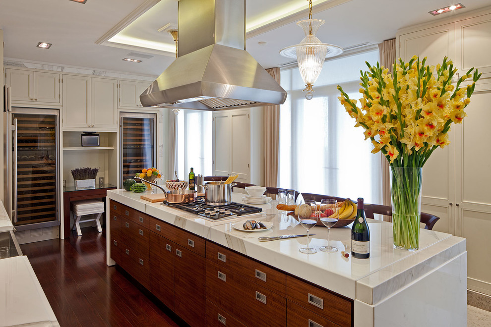 Transitional kitchen in Toronto with recessed-panel cabinets, white cabinets and stainless steel appliances.