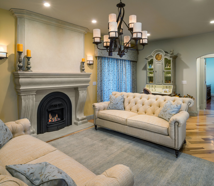 Photo of a large transitional formal open concept living room in Providence with multi-coloured walls, medium hardwood floors, a stone fireplace surround and no tv.