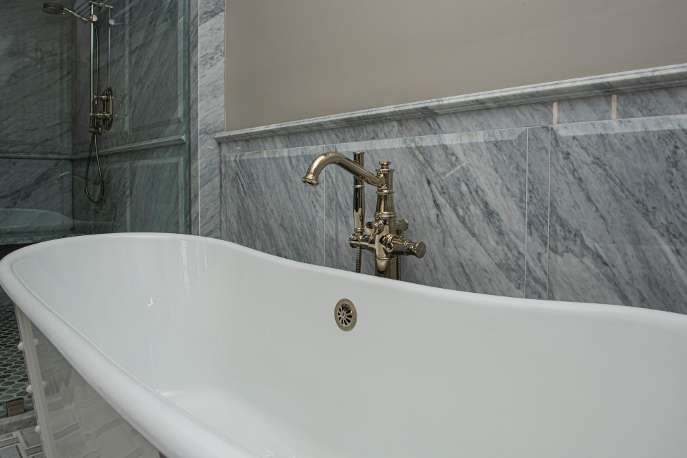 This is an example of a bohemian ensuite wet room bathroom in Indianapolis with a freestanding bath, grey tiles, marble tiles, beige walls and porcelain flooring.
